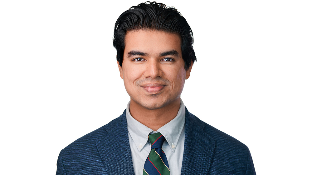 Headshot of Dipayan Banerjee on a white background