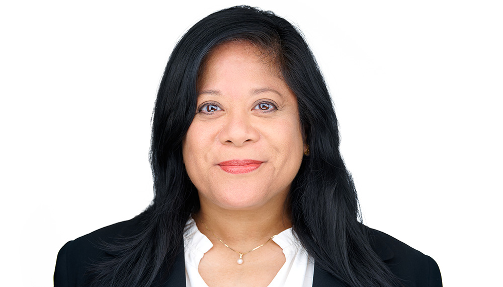 Headshot of Gigi Sharba in white background