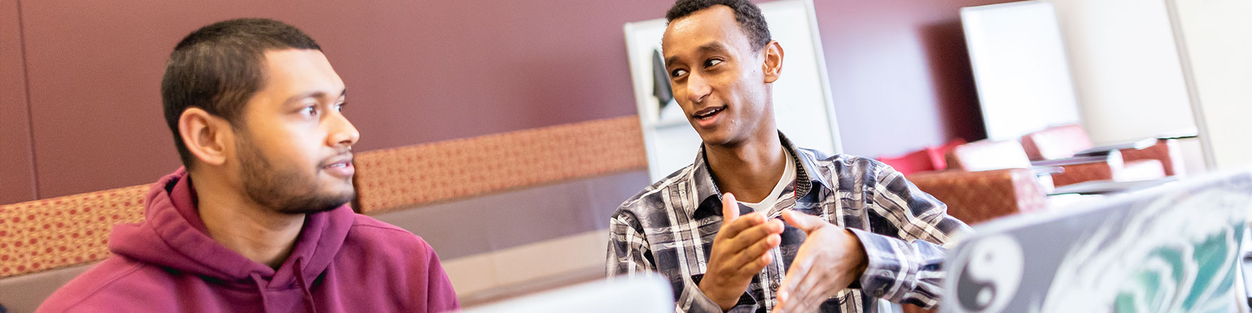 Loyola University Chicago student and mentor interact within the Office of Research Services. Loyola University Chicago student and mentor interact within the Office of Research Services.