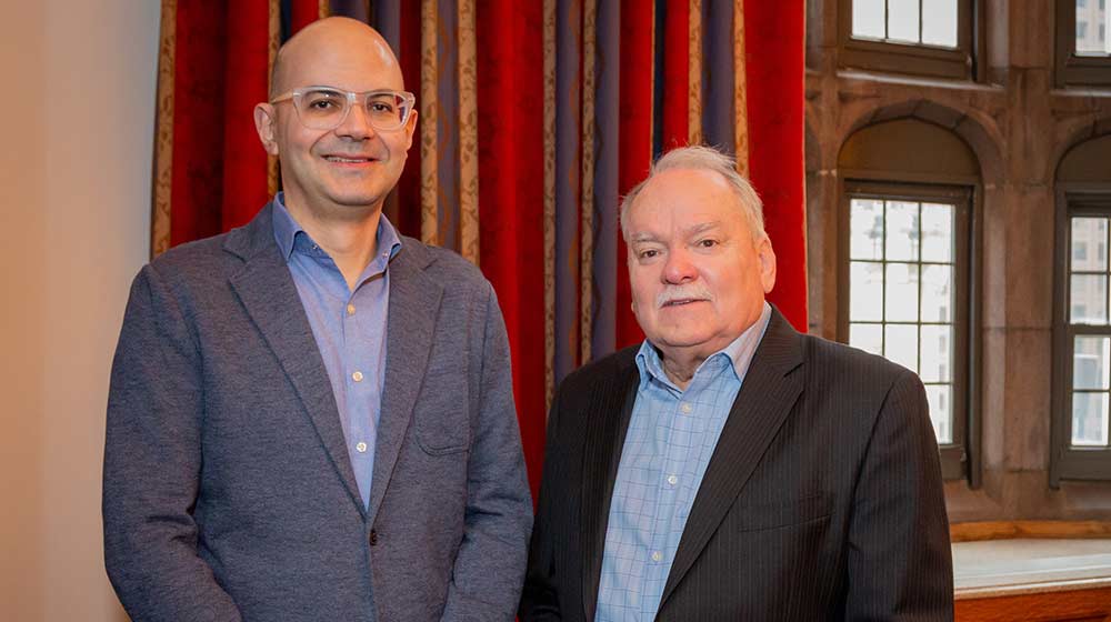 Julian Diaz and Doug Evanoff standing next to each other Julian Diaz and Doug Evanoff standing next to each other